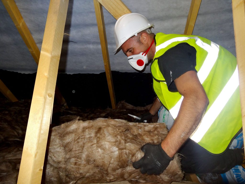 Loft insulation installing